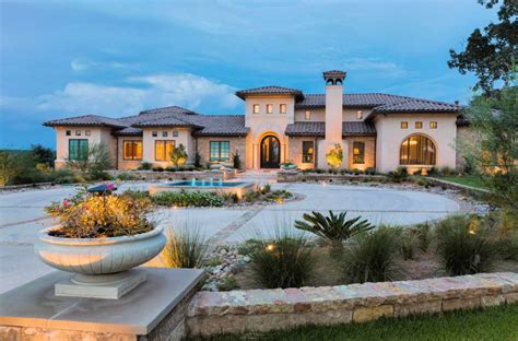 mediterranean style house with metal seam roof|17 Breathtaking Mediterranean Home Exteriors .